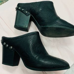 Black heeled mules with silver detailing